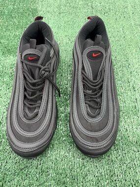Nike Men’s Black Athletic Sneakers with Red Swoosh Accent